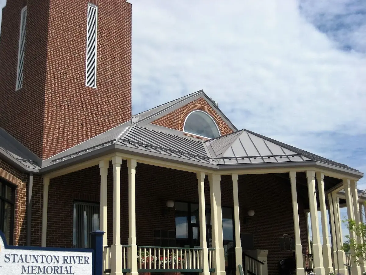 Skilled roofing craftsmen working on a residential roof in Kenneth City
